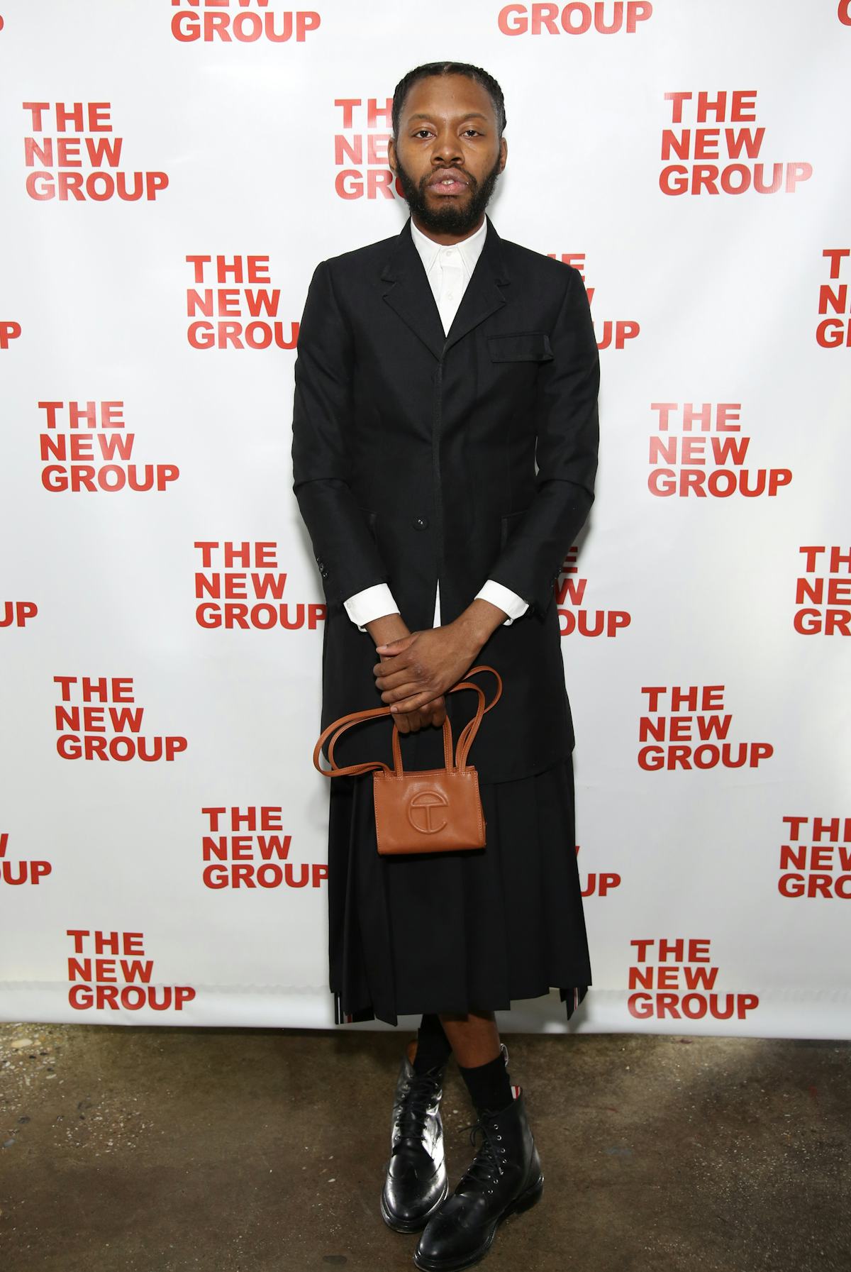 Jeremy O. Harris with a Telfar bag. 