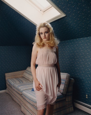 Julia Garner wears a Chanel Haute Couture dress and cropped pants; Bulgari necklace.