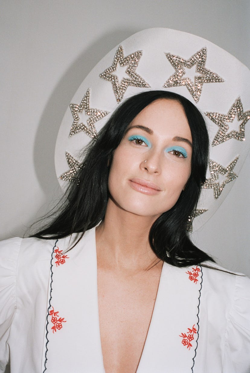 Kacey Musgraves in cowboy hat. 