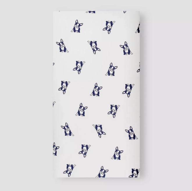 Fitted crib sheet; white with navy blue puppies