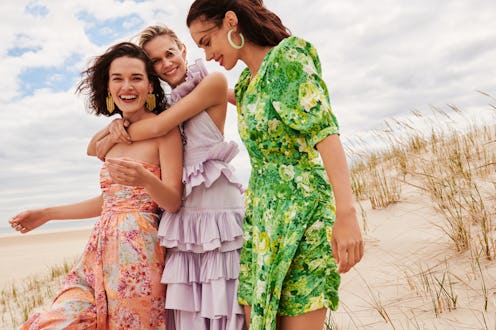 Models wearing floral dresses in Rent The Runway's April 2021 editorial.