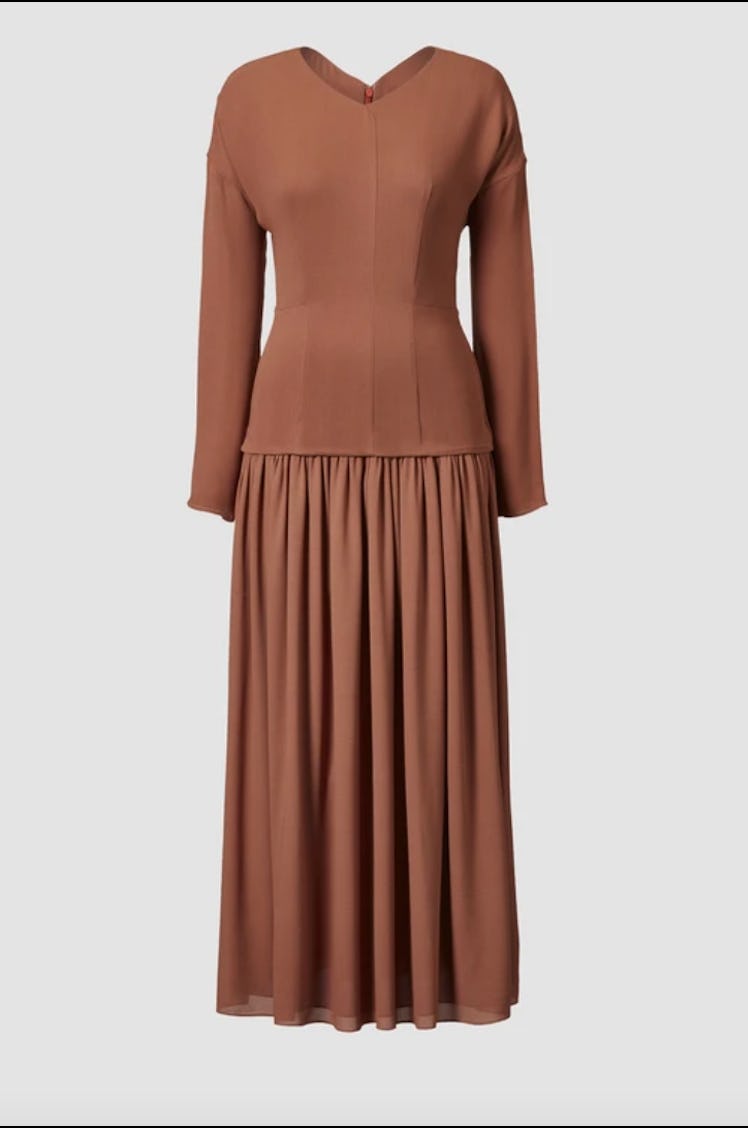 TOVE's midi dress with long sleeves in the color rust. 