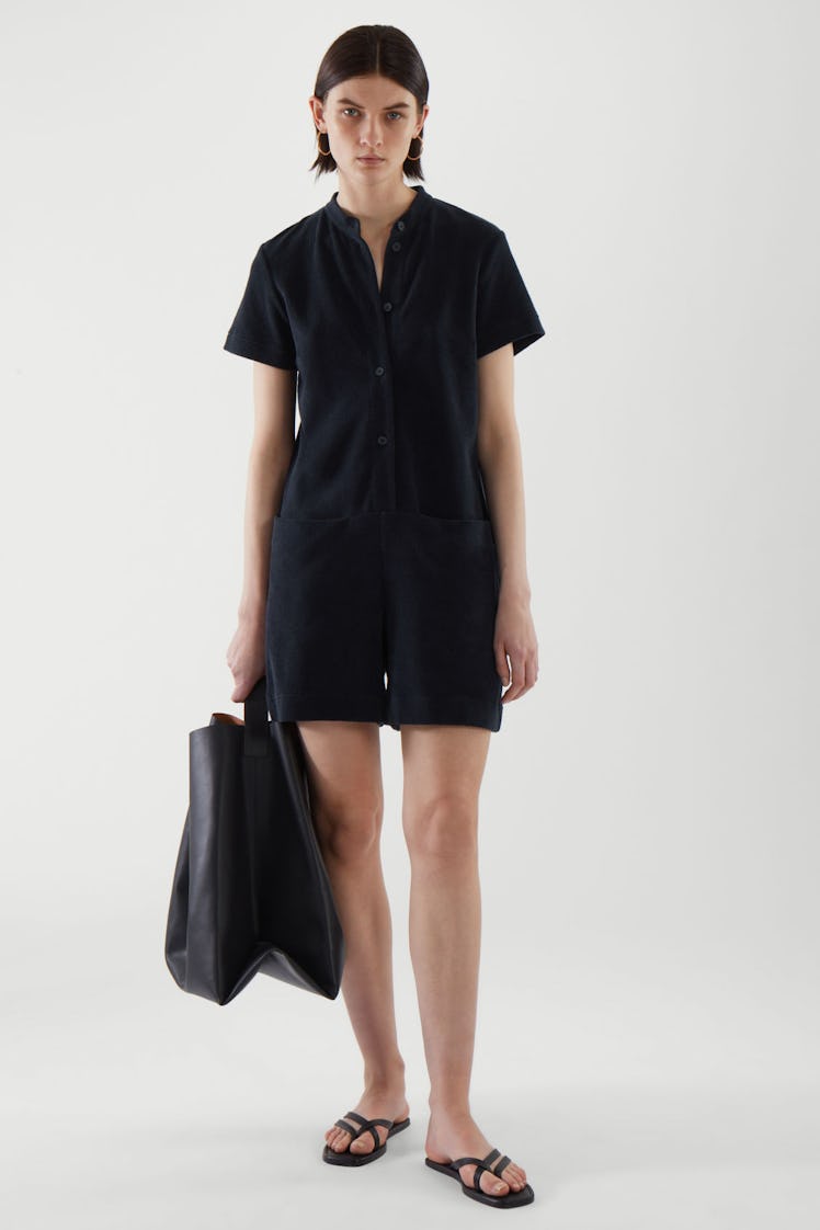 Dark navy terry towelling playsuit from COS.