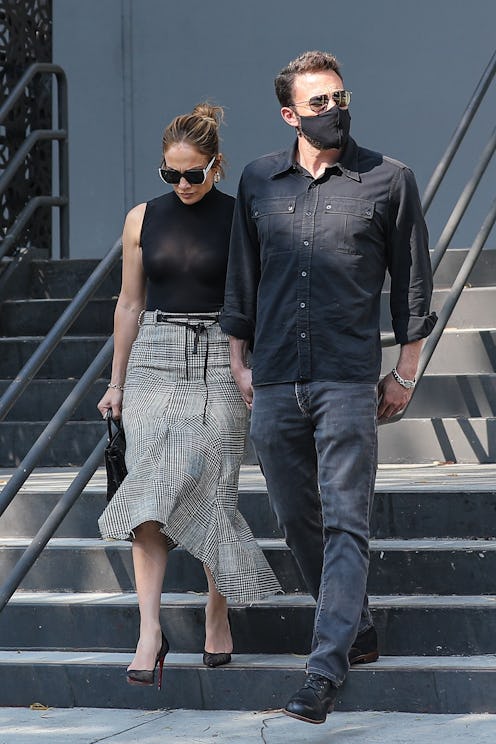 Bennifer walking hand in hand.