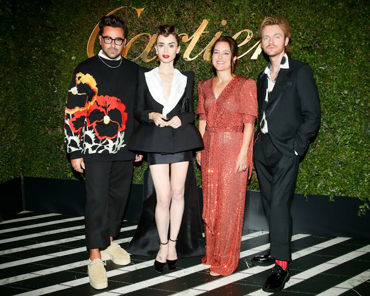 Dan Levy, Lily Collins, Mercedes Abramo, and Finneas posing at the launch of the Clash [Un]limited c...
