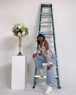 Digital creator and influencer Cierra Nia wears Maison Margiela white Tabi boots in her Instagram po...