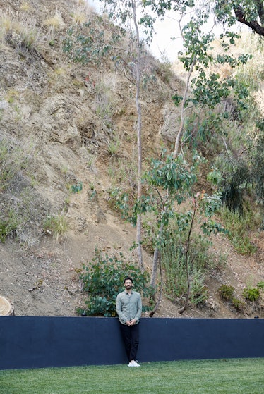 Kordansky in his backyard, against the hills of Griffith Park.