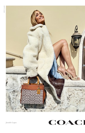 Jennifer Lopez stars in Coach's new Rogue bag campaign, carrying a Rogue 25 handbag in signature tex...
