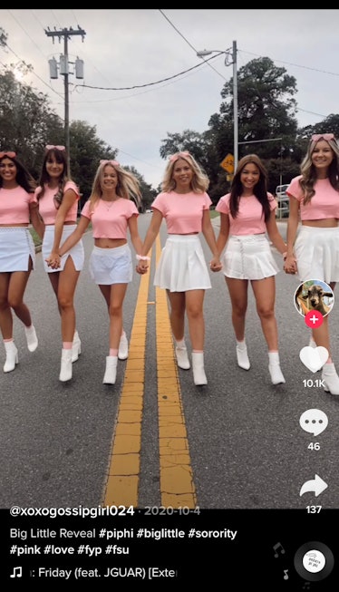 A pledge family of sorority sisters shows off their pose ideas for a Big Little reveal on TikTok. 