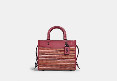 Coach Rogue 25 bag in red upwoven leather.