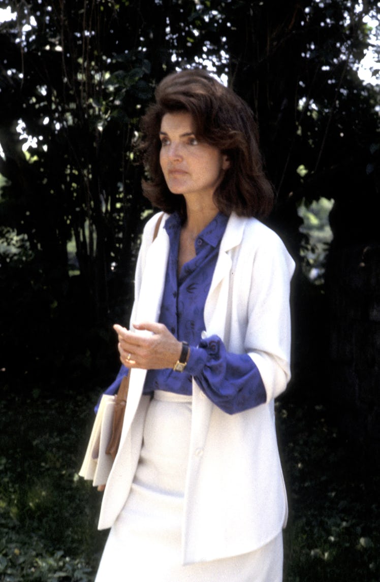  Jackie Kennedy in a white blazer with elbow-length sleeves, a matching skirt and blue blouse at the...