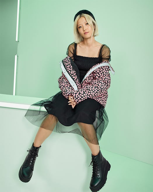 A model in a black sheer dress and polka-dotted jacket from the Target Fall Designer Collection