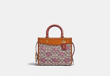 Coach Rogue 25 bag in Signature Textile Jacquard With Embroidered Elephant Motif.