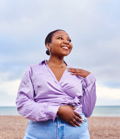 Young woman smiling because September 6, 2021 will be the best day of the month for every zodiac sig...