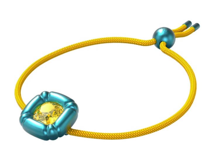 Swarovski's Dulcis bracelet with a cushion cut blue crystal. 