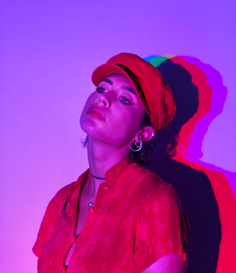 Young woman with a red hat wondering the emotional meaning of the September 2021 new moon in Virgo.