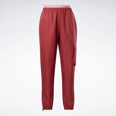 Cardi B's track pants in red and pink. 