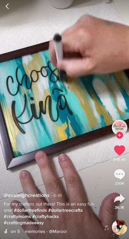 A TikToker paints a picture frame from the dollar store and uses it as a message board in their dorm...