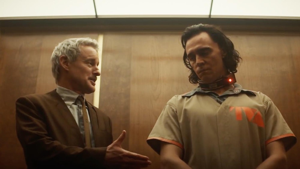 Mobius talks to Loki in a TVA elevator in Loki episode 1