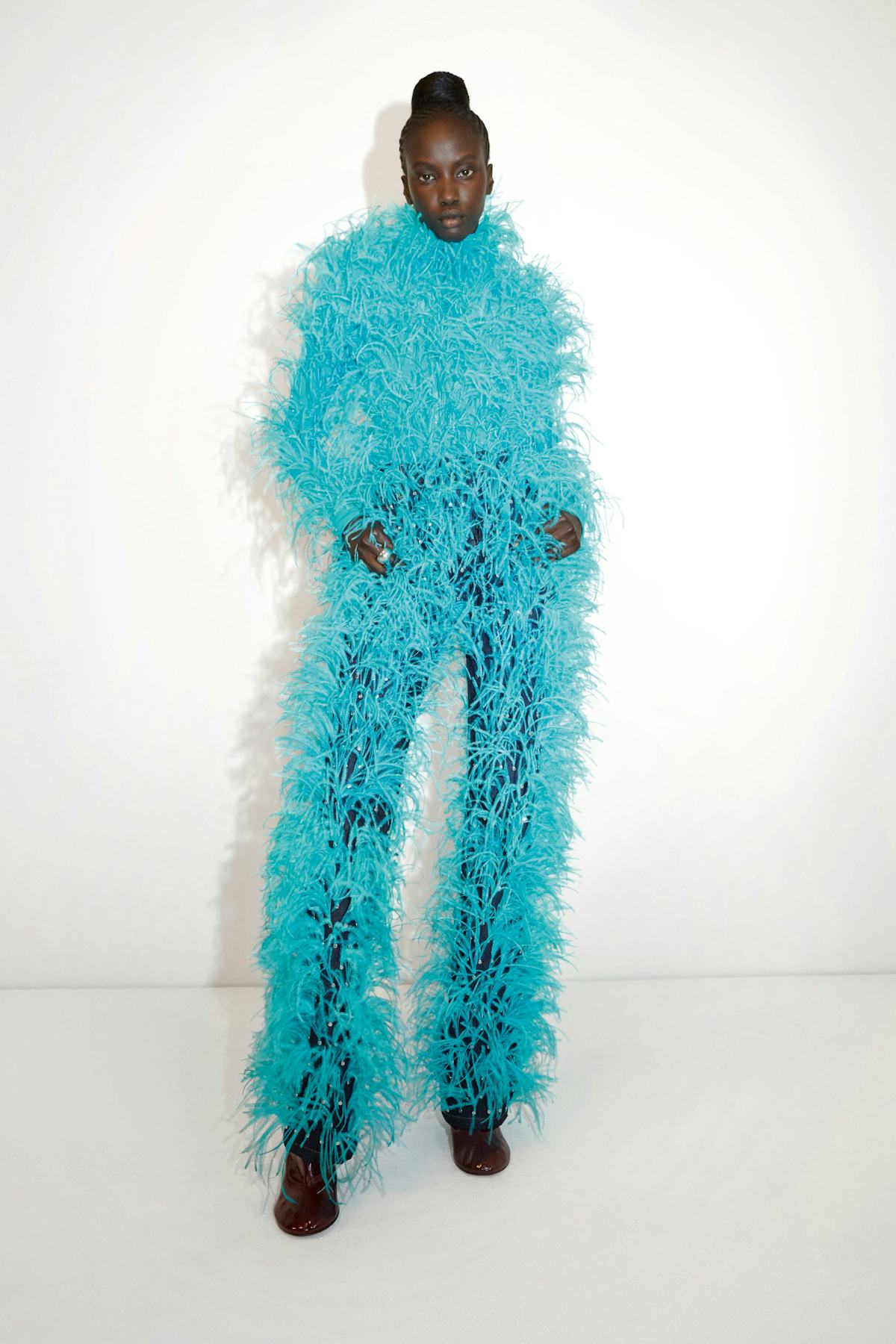 Tracee Ellis Ross Casually Wears a Full Feather Suit Around the House