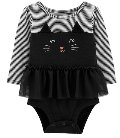 Image of a baby's onesie with a cat's ears, eyes and whiskers.