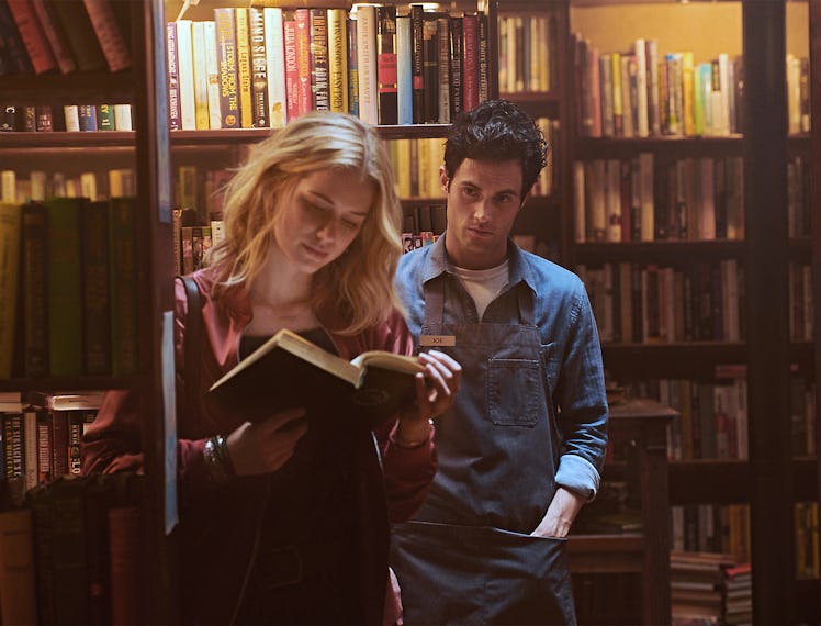 Joe and Beck in the book store in You