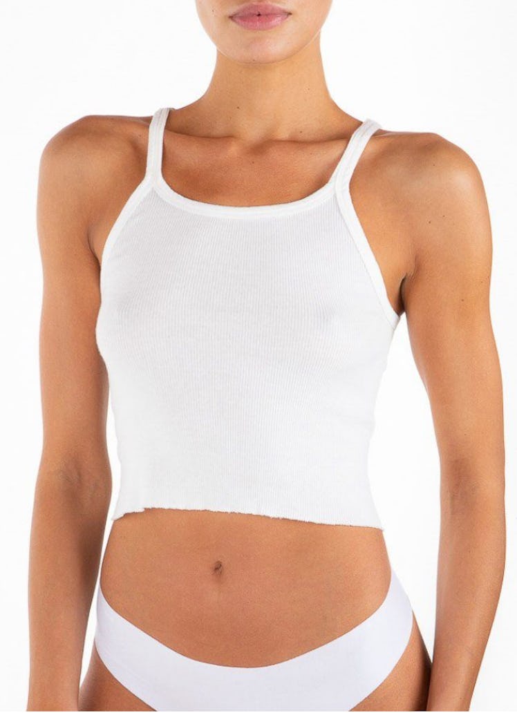 Eterne's cropped rib tank in the color ivory. 