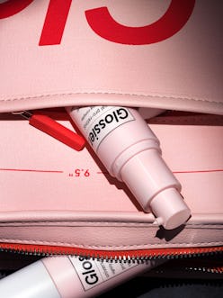 Glossier Universal Pro-Retinol peeking out of bag