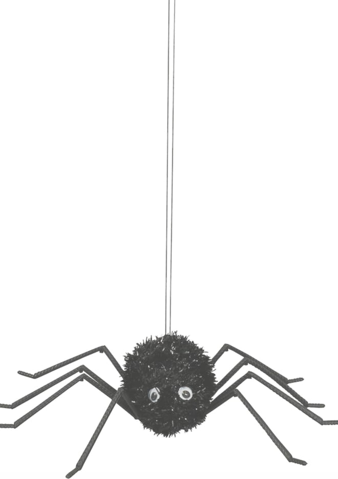 you can buy this hanging black spidertinsel decor at dollar tree for halloween
