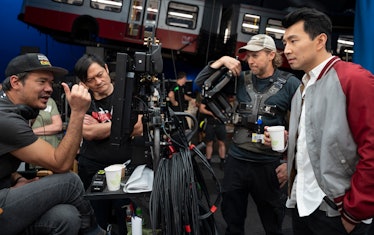 Director Destin Daniel Cretton and actor Simu Liu on the set of 'Shang-Chi and the Legend of the Ten...