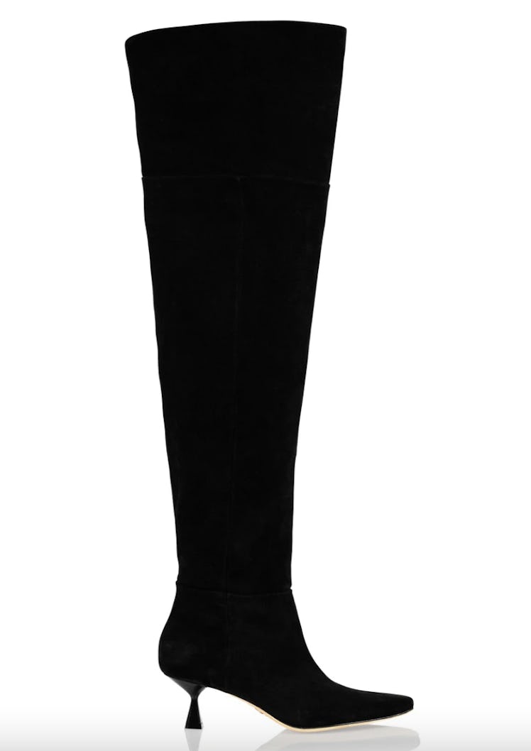 Brother Vellies' over-the-knee black boots. 