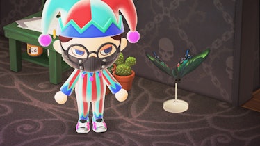 A character next to a peacock butterfly in Animal Crossing: New Horizons