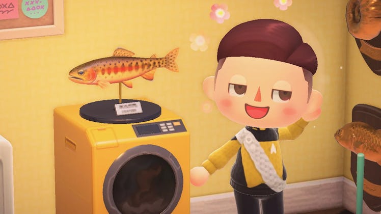 A character next to a golden trout fish in Animal Crossing: New Horizons