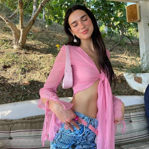 Singer Dua Lipa wears full Blumarine Resort 2022 look with Annele cherry blossom ring on her Instagr...