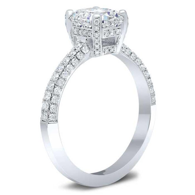 deBebians' 3 sided pave engagement ring with a pave basket and hidden halo.