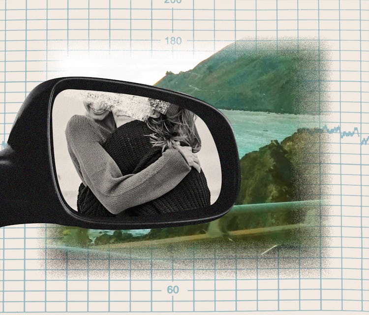 View on two sisters hugging in a rearview mirror