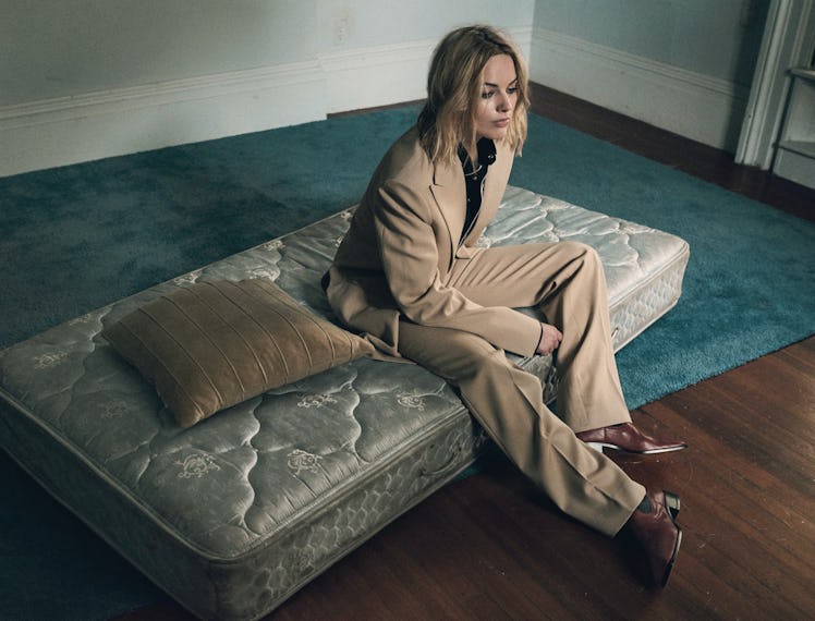 Margot Robbie on a bare mattress.