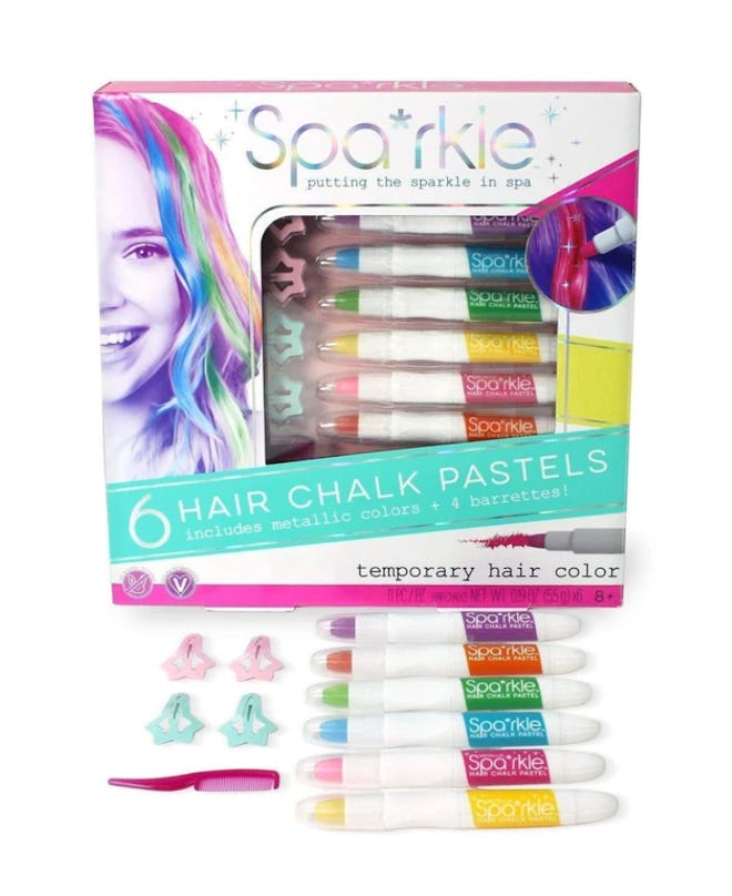 Product photo; packaging for six-piece hair chalk set with chalks and barrettes displayed in front o...