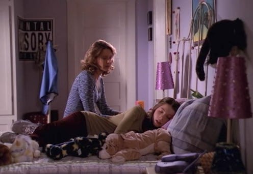 A screenshot from Buffy the Vampire Slayer, showing Joyce Summers comforting Dawn Summers. These are...