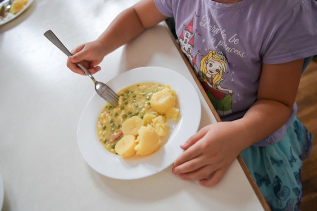 german student eating school lunch