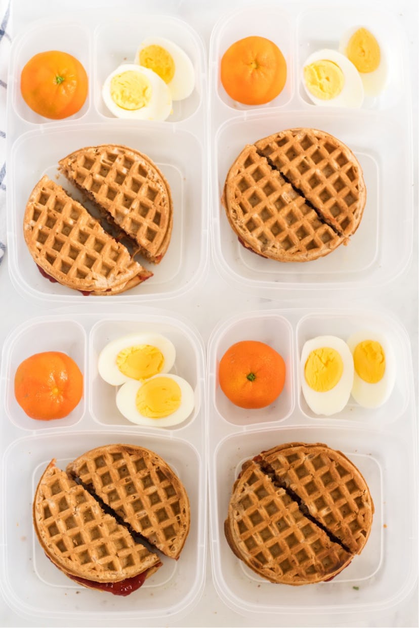 waffle sandwich toddler lunch box with an orange and egg