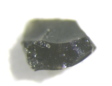 This small piece of lunar glass was formed and magnetized by a meteorite impact and could explain th...