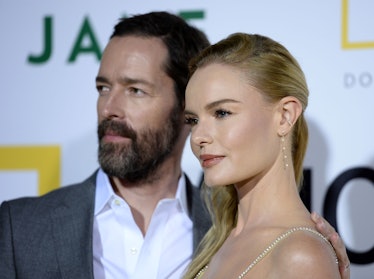 Kate Bosworth in white dress and Michael Polish in a white shirt and a grey blazer
