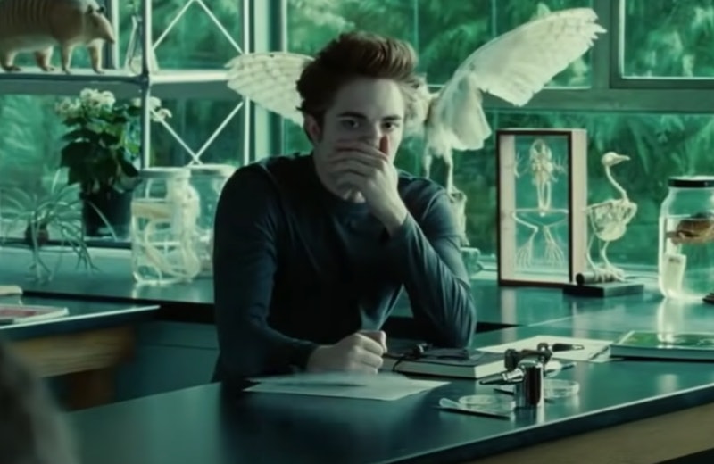Edward Cullen (Robert Pattinson) holds his face in horror in a still from the first Twilight film.