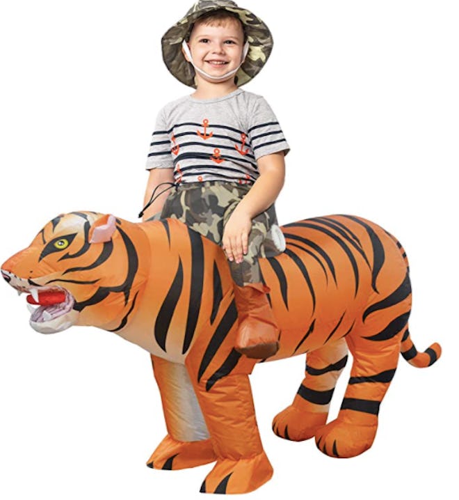 Child in a tiger wrangler costume