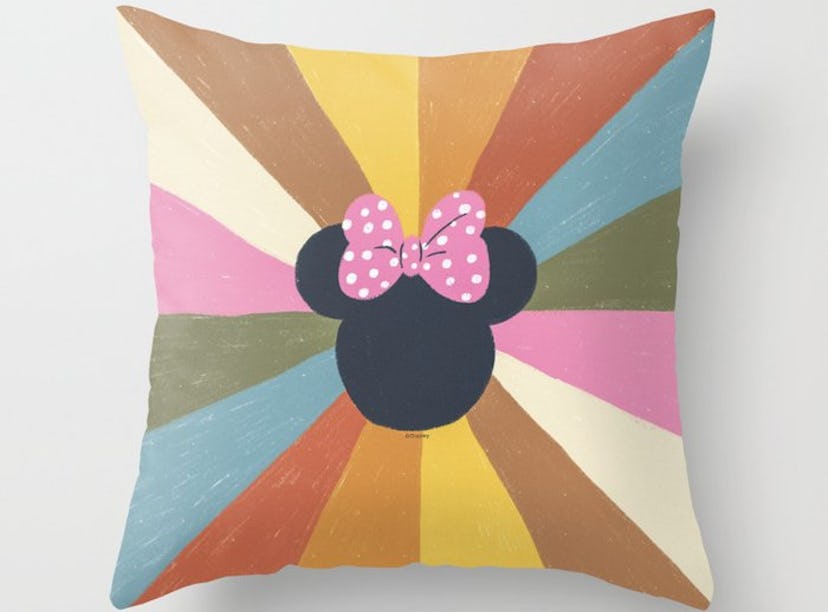 The Society6 Disney Minni Mouse collection has colorful throw pillows and other decor.
