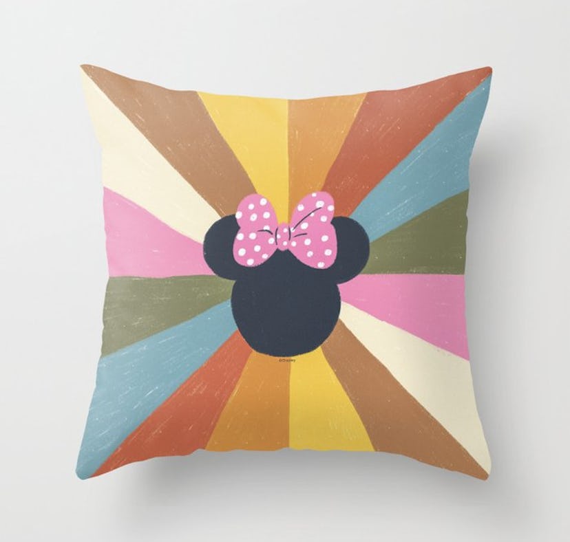The Society6 Disney Minni Mouse collection has colorful throw pillows and other decor.