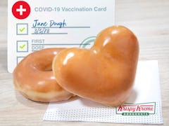 Krispy Kreme’s new free doughnut vaccine deal will score you two treats.