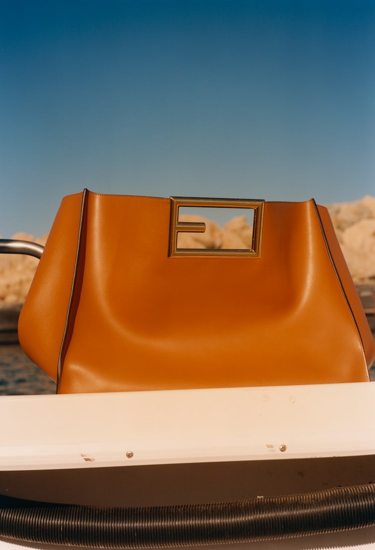 A camel-brown Fendi bag