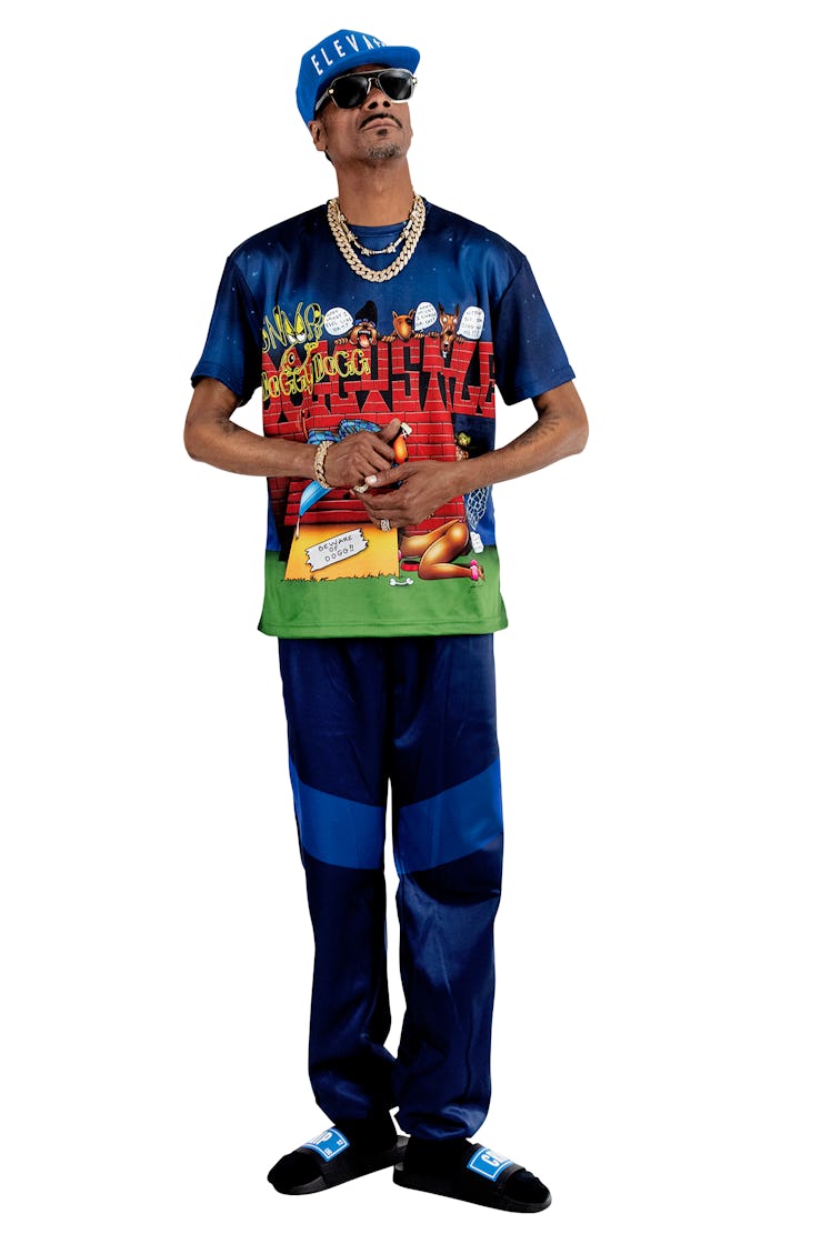 Snoop Dogg wears a T-shirt from his own line.